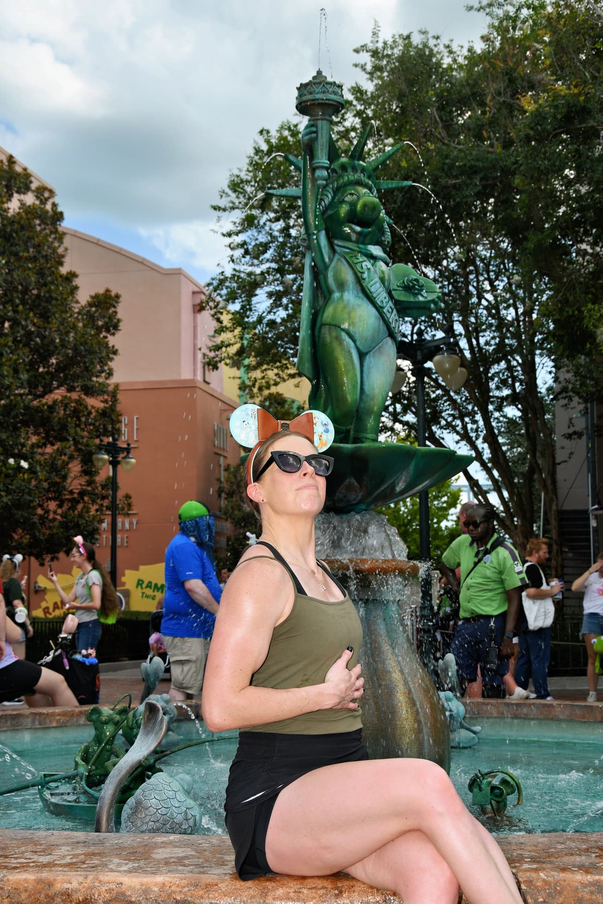 Jen at Disney with a big smile.